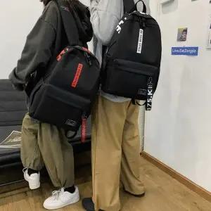 남여공용 레터링 스트랩 포인트 베이직 가방 백팩