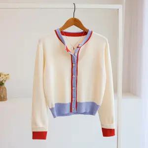 [잇수다] 델르카 라인배색 소매 레이어드 라운드 니트 가디건