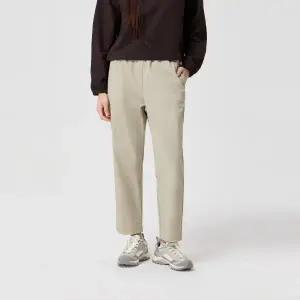 [코오롱스포츠](본점) 여성 크롭 테이퍼드핏 스트레치 밴딩 팬츠 TVPNA24412LBE