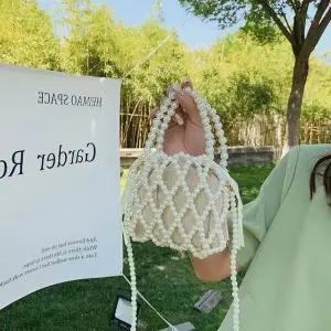 [하프클럽/셀러허브_여성트랜드패션]비즈 핸드백 가방 여름 핸드폰 크로스