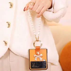 유니블링 갤럭시 z플립 3 4 5 리본 큐빅 진주 스트랩 링 케이스