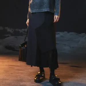 [피플오브더월드] 헤링본 콤비 플리츠스커트