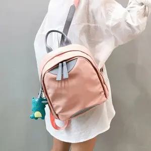 꾸안꾸룩 여성 배색 인형키링 미니백팩 귀여운가방 데일리 여행