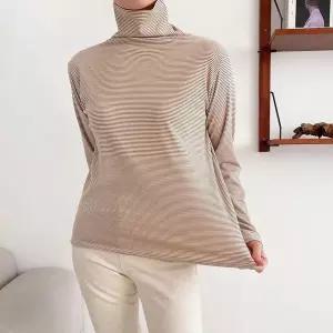 [하프클럽/셀러허브_여성트랜드패션]여성용 겨울 잔줄 목폴라 스판 기모 티