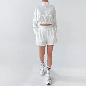 블레오 여성 스트링 크롭 바람막이 반바지 세트 DM251216121