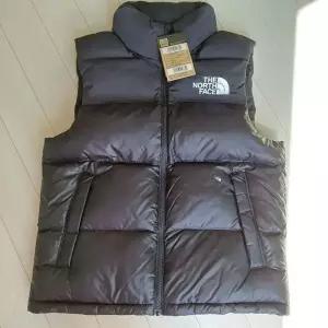 노스페이스 패딩 조끼 눕시 온볼 베스트 블랙