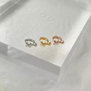 /신상오픈런 러키니 크로스 여성 원터치 로즈골드 피어싱 이어링