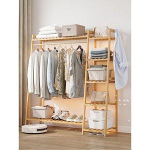 행거가 있는 침실 침대 끝에는 밤에 옷 신기 옷 수납장 가정용 원목 간이 옷걸이