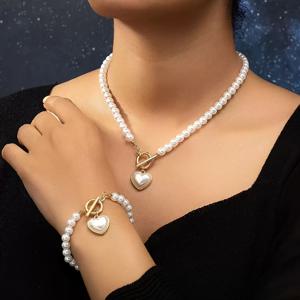TEMU 세련되고 고급스러운 모조 진주 하트 모양 팔찌와 목걸이 2개 세트. 트렌디한 유럽 및 미국 스타일로 디자인되었습니다.