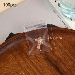 TEMU 100개 투명 재사용 가능 자체 밀봉 보석 보관 백 - 녹 방지, 귀걸이, 반지 및 작은 물품 보관에 적합한 투명 재밀봉 가능 백, 보석 정리 및 전시, 보관에 적합