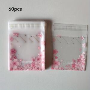 TEMU 체리 blossom 디자인의 투명한 프로스트 선물 가방 60개 세트. 핑크색 자체 밀봉 가방에 정리되어 있습니다. 정교한 선물, 소형 제품, 결혼식, 축하 행사, 생일 티 파티용 파티 답례품 포장에 이상적입니다.