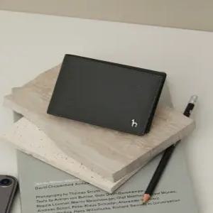 헤지스 액세서리 남성 24FW [스테디셀러]그린 단색 소가죽 반지갑 WUWA4F372E3