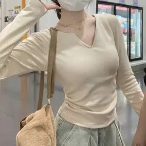 여성 긴팔 트임 셔링 패드내장 티셔츠