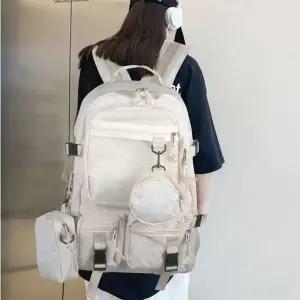 전면 메쉬 포켓 레터링 포인트 캐주얼 백팩 가방_24533112