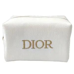 디올뷰티  골드로고 베이지색상 캔버스 파우치