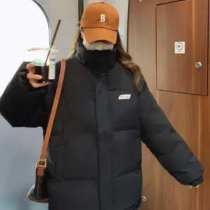 여자 OC29DG91 겨울 출근 룩 직장인 검정 하이넥 패딩 점퍼