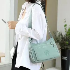 전면 지퍼포켓 다중수납 경량원단 데일리 외출용 크로스백 6SS