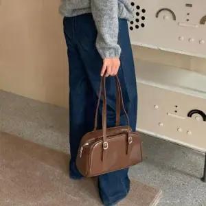 컴팩트 라운드 쉐입 더블 핸들 지퍼 수납 데일리 토트백 6SS