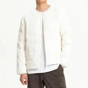 [뉴발란스] 매장판 공용 액티브 라이트 구스다운 경량 패딩 아이보리 NBNPE41913-39