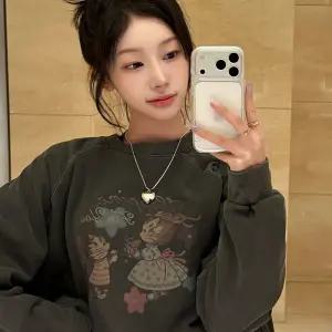 해피토미 레글런 피그먼트 맨투맨 스모크블랙