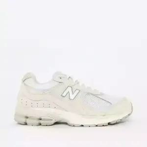 뉴발란스 뉴발 2002 아이보리 공용 스니커즈 U2002RAC