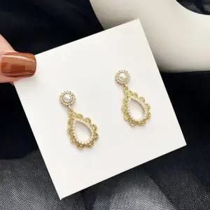 [셀러에이드]진주 물방울 귀걸이 여성 은침 오벌 이어링