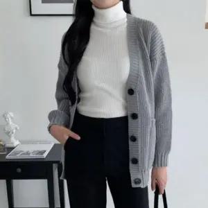 패션스타일 루즈핏 왕단추 가디건 여성