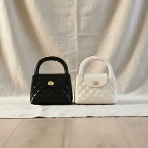 [다잇템] 여성 데이백 누빔 컨템포러리 핸드백