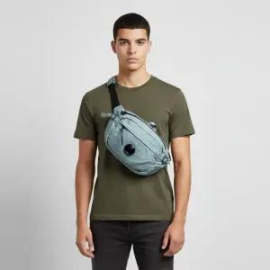 20CMAC734A 005269G 809 렌즈 와펜 크로스바디 슬링백