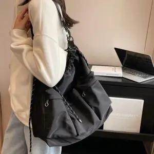 여성 스트링 포켓 포인트 투웨이 숄더 크로스백 WFFNJ9J