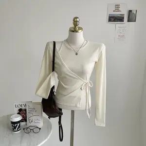 홀터넥 이너와 랩 볼레로 가디건 일체형 골지 긴팔티 E258솔라랩티셔츠