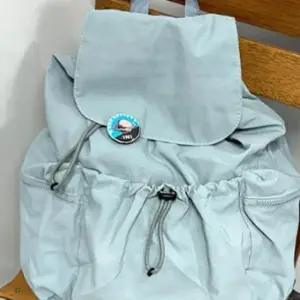 지퍼 포켓 경량 소재 일상용 캐주얼 스포츠 조절 가능한 스트랩 백팩 학생 직장인