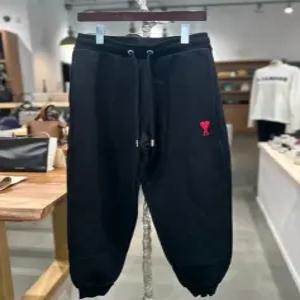 아미 하트로고 트랙 팬츠