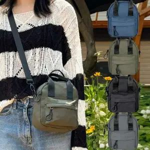 남녀공용 IOW302B0 미니크로스백 손가방 데일리 심플 토트 지퍼