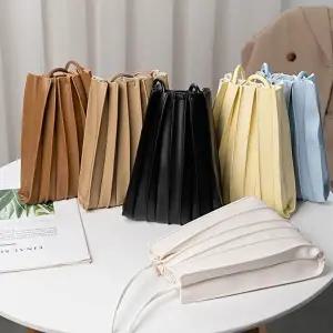 스트랩크로스백 주름 크로스 미니백 웨이브 쉐입 폰가방 똑딱이 단추