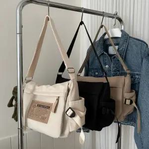 남여공용 페이퍼 패치 메신저백 크로스백 커플 슬링백 JFs4+1kxQ