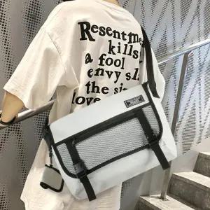 베이직 스타일 메쉬포켓 디자인 메신저백 남여공용