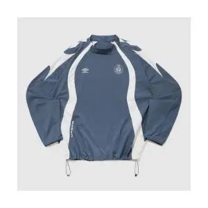 엄브로 UMBRO PTR 우븐 워밍업 하이넥 긴팔 피스테 블루 UR121SWT39 UR121SWT39_BRS0 129261