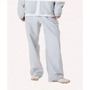 엄브로 UMBRO 엔지니어드 우븐 와이드  조거 2WAY 팬츠 라이트 그레이UQ121CPT23 UQ121CPT23_WGR0 323966