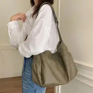 [다잇템] 여자 미니멀리즘 휘뚜루 어깨 2WAY 개강룩 주머니 크로스백