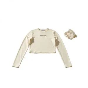 [질샌더] 크롭 스윔 탑 긴소매 지속 가능한 빠른 건조 저지 153582295