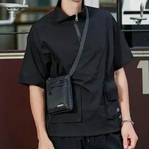 여행 보조가방 세로형 숄더백 전면포켓 수납 미니 크로스백