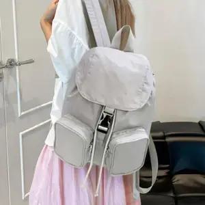 [신상오픈런]여성용 포켓 장식 스트링 캠퍼스 백팩 (42085663)