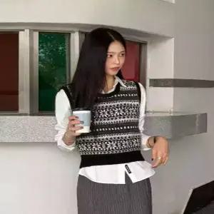 제너럴아이디어 generalideastandard 페어아일 니트 베스트 [BLACK] WBE4L06541