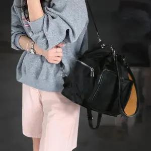 [신상오픈런]여성 대학생 스타일 투포켓 카고 조리백 블랙 백팩 (40818333)