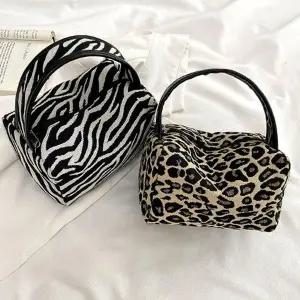 [룽스]파우치 토드백 지브라 레오파드 호피 가방