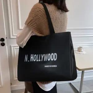 레터링 블랙 숄더백 큰가방 여행보조 직장인 캐주얼 여성패딩숄더백 캔버스백 여성버킷백