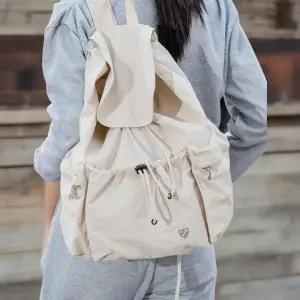 [신상오픈런]여학생용 나일론 조임끈 스트랩 캐주얼 백팩 (37000833)