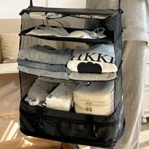 [셀러에이드]여행용 걸이 압축 수납함 접이식 다용도 매직 파우치 용품 대