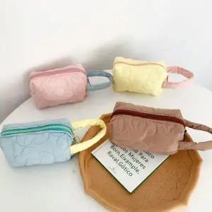 (앙상블) 패딩 플라워 손잡이 파우치 가방 화장품